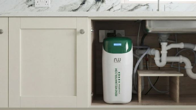 Green water softener fitted under sink, compact