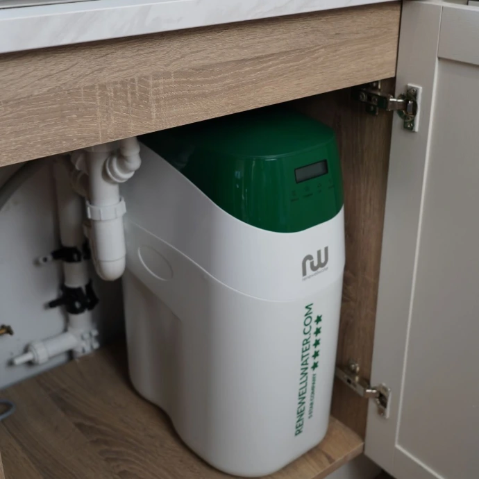 Green water softener compact design fits  seamlessly under any sink