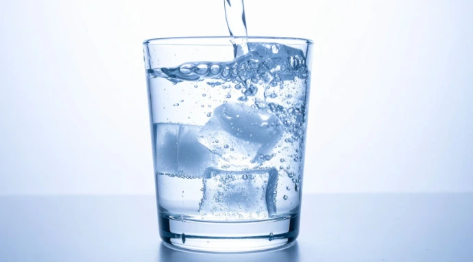 glass of water with ice cubes