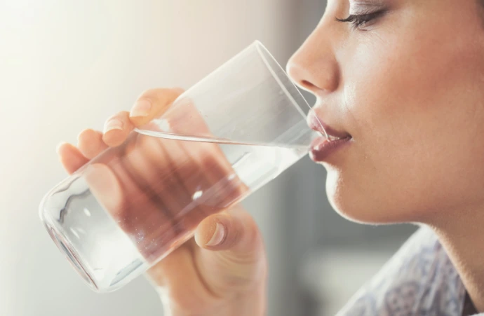 Woman drinking a glass of water